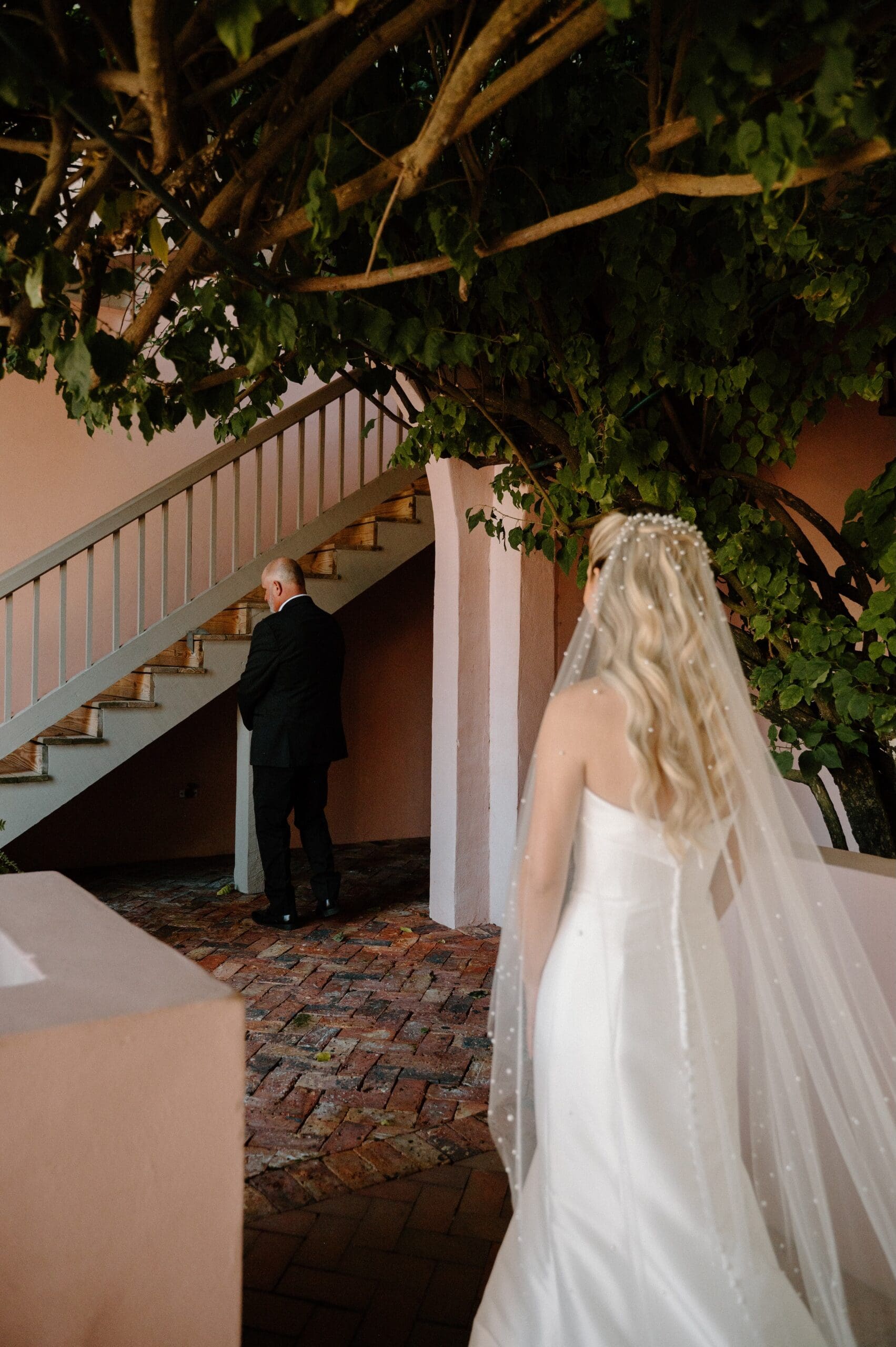 Bride and groom seeing each other during their wedding first look